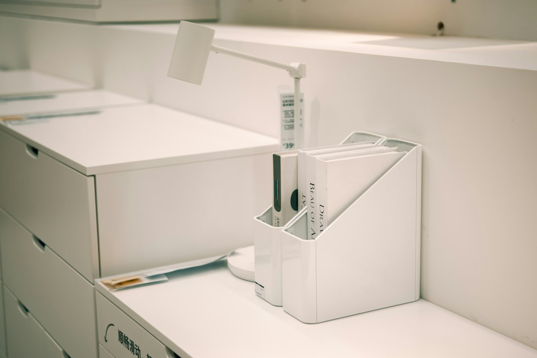A tidy desk organizer holding files and pens — keeping the inventory current under regular review