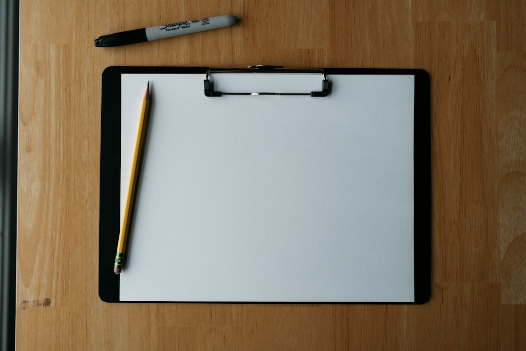 A clipboard with a pen, representing the renewal re-assessment checkpoint